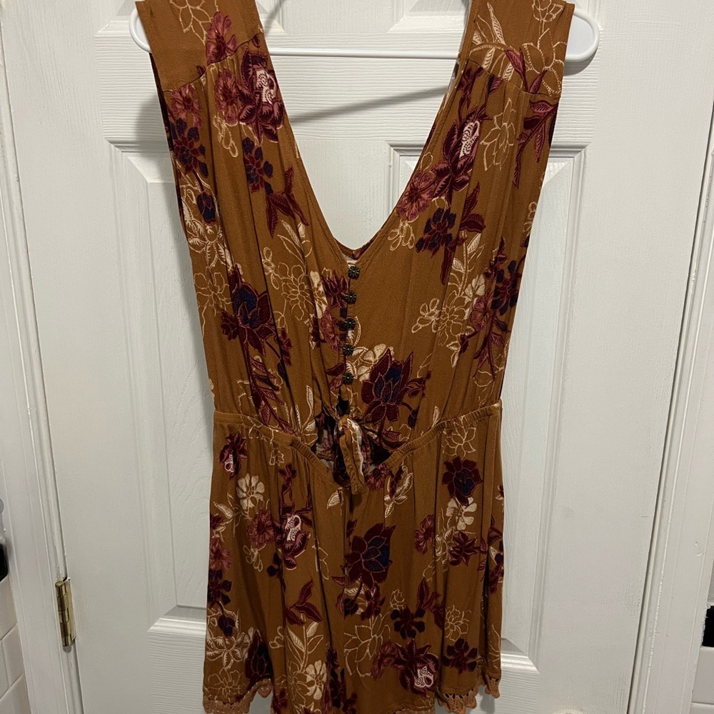 Floral Romper with Lace Trim and Front Cut Out